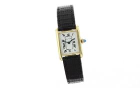 Damenarmbanduhr Cartier Handaufzug 750/- Gelbgold mit Lederband, ohne Box und ohne Papiere
