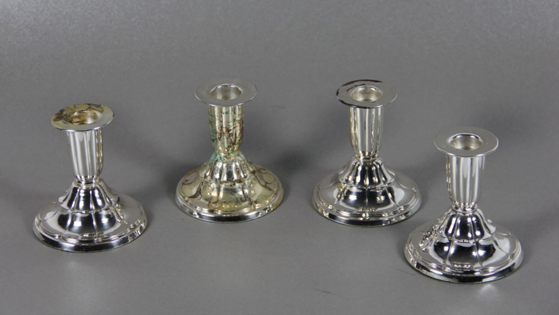 Satz kleine Kerzenhalterje 800er Silber, 4 Stk. kleine einflammige Kerzenhalter, gefüllter G