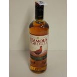 Bottle of Famous Grouse Whisky