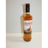 Bottle of Famous Grouse Whisky