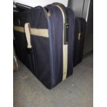 2x Wheeled Suitcases