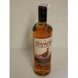 Bottle of Famous Grouse Whisky