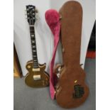 Electric Guitar in Case - Marked Gibson Les Paul - NB: We Cannot Confirm Authenticity
