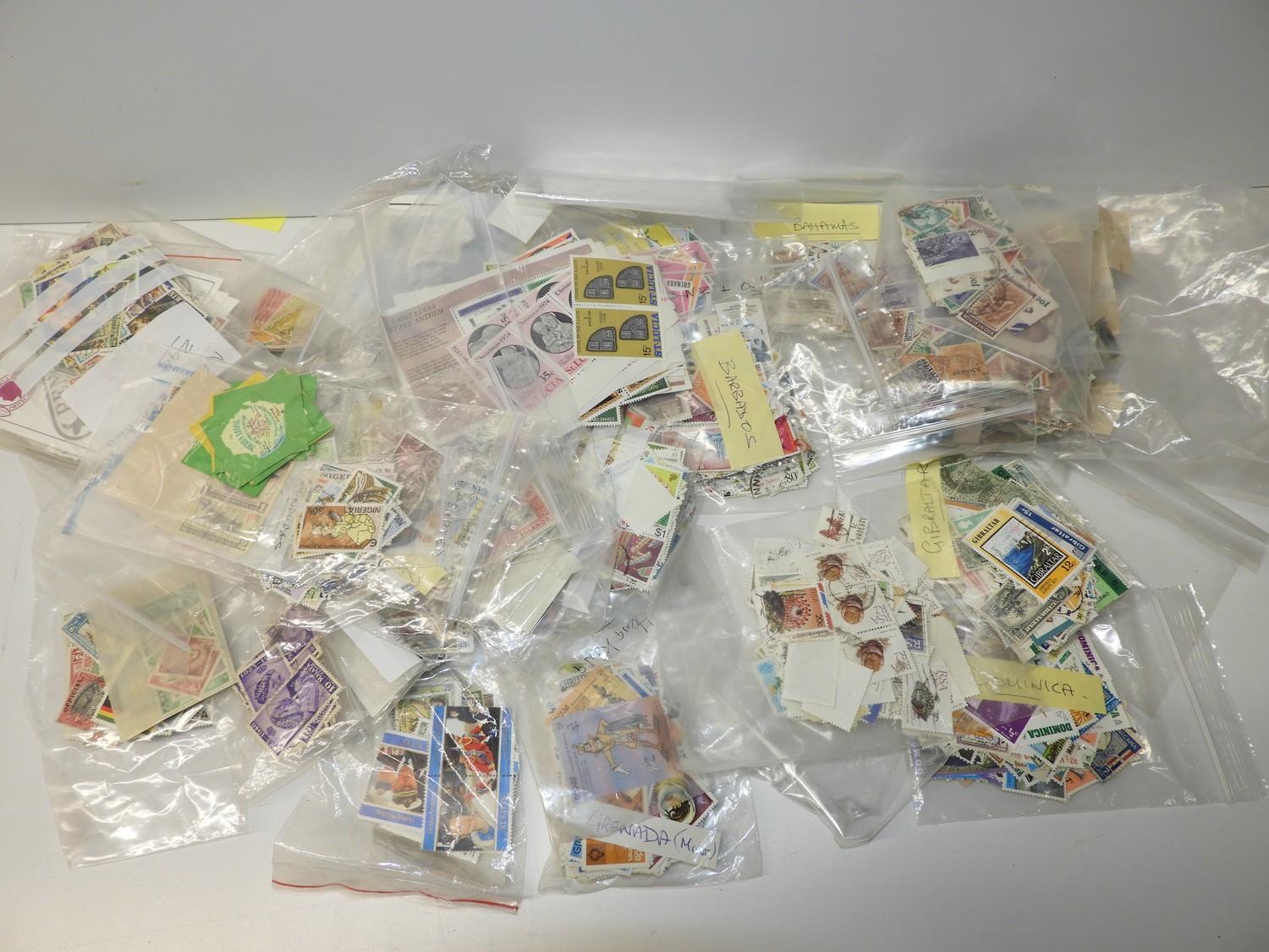 Box of Commonwealth Stamps in Packets - 1500+ Stamps