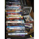 Box of DVDs and CDs