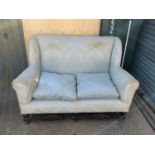 Two Seater Sofa on Turned Ornate Wooden Frame - 104cm High x 135cm wide