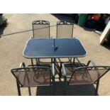 Glass Topped Garden Table and 4x Chairs