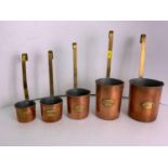 Graduating Copper Measuring Jugs