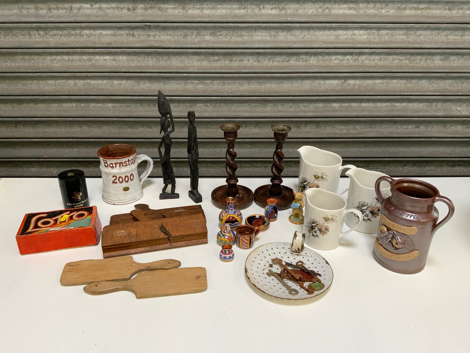 Collectables - Graduating Jugs, Butter Pats and African Wooden Figures etc