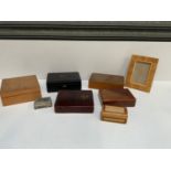 Variety of Empty Boxes and Wooden Picture Frame
