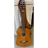 Cased Acoustic Guitar