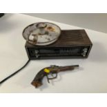 Clock Radio, Candlestick and Pistol Lighter