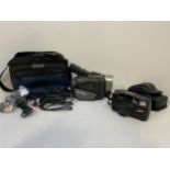 Sony Video Camera Recorder in Case and Samsung Camera