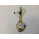 9ct Gold Ladies Omega Watch with 9ct Gold Brick Link Bracelet with Adjustable Clasp and Safety Chain