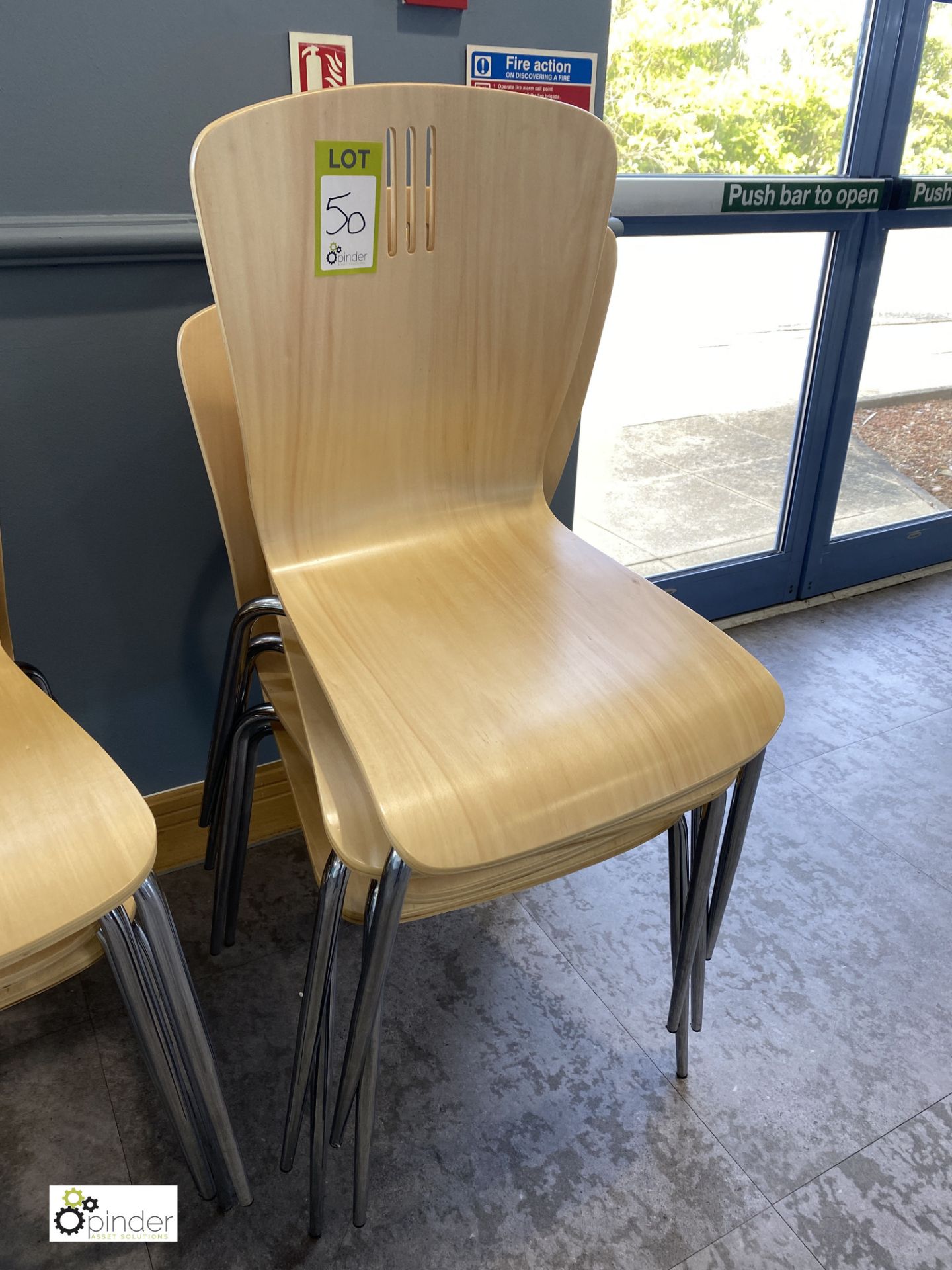 4 beech effect stackable Refectory Chairs (located in Restaurant)