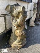 Reconstituted stone Statue of a pig playing pipes,