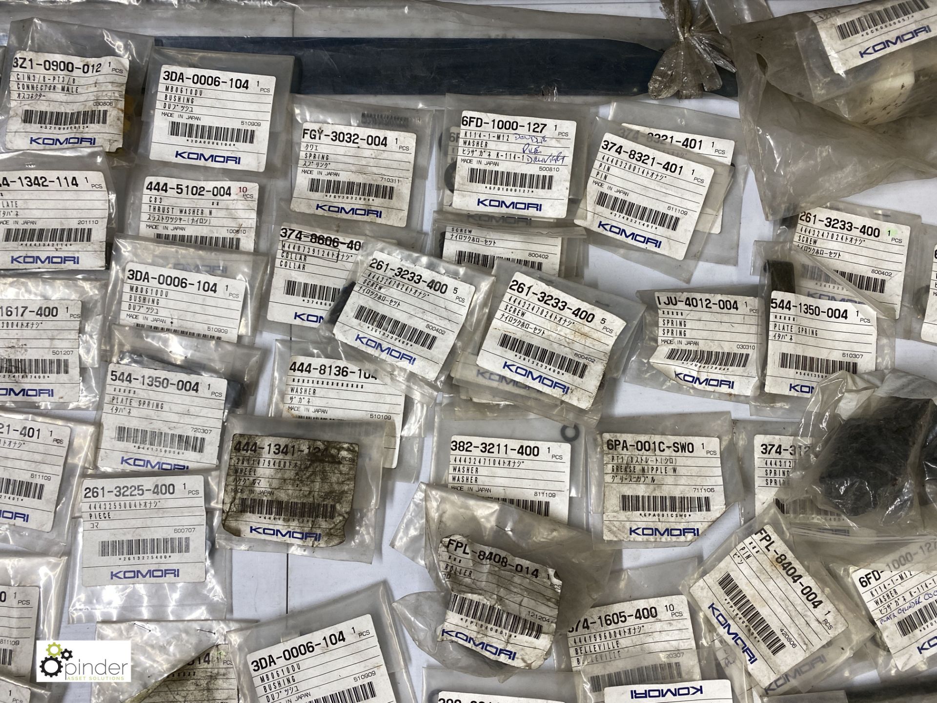 Large quantity of unused Komori spare parts inc. pins, knobs, washers, feeder tape, brackets, - Image 7 of 18