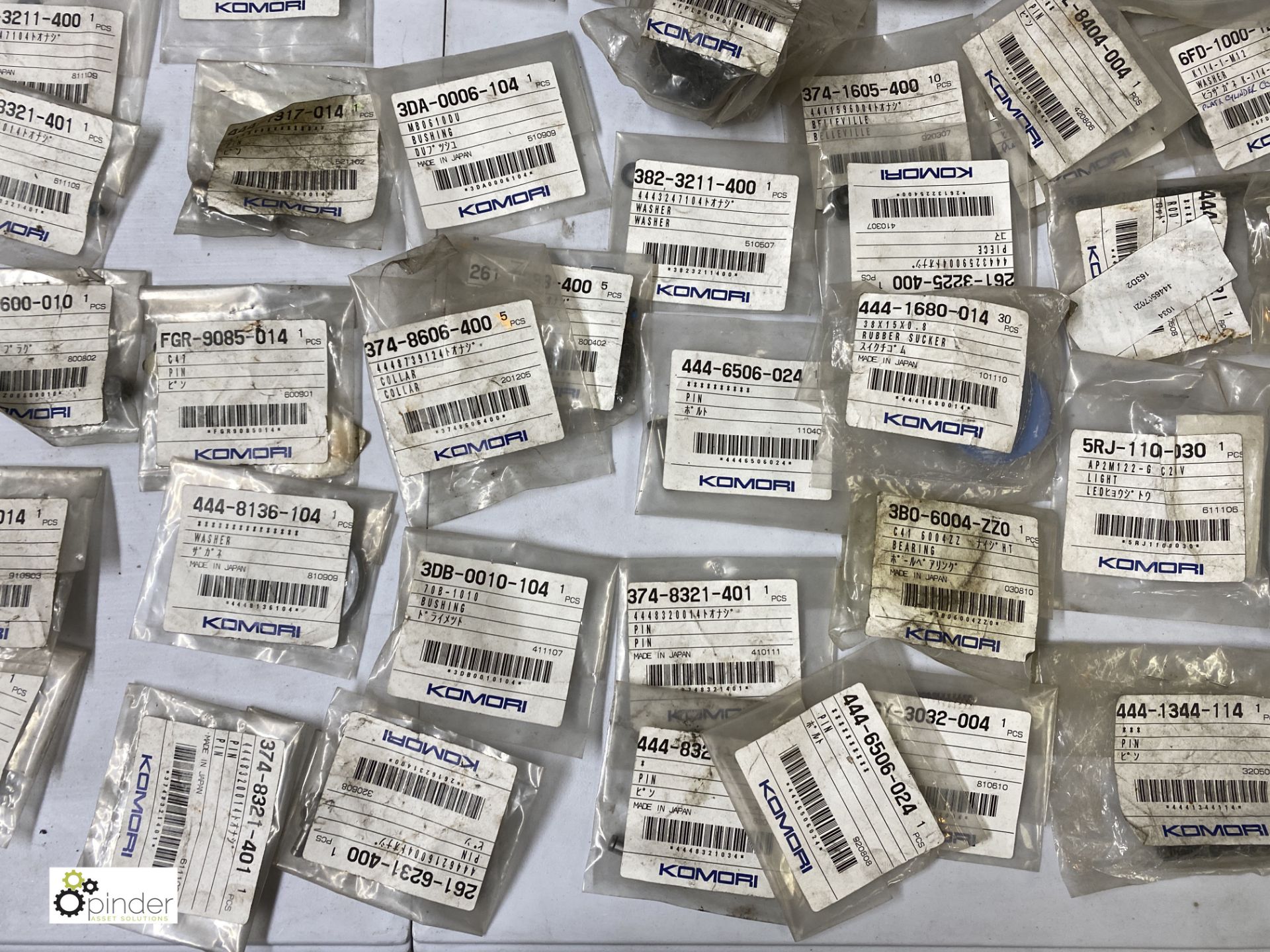 Large quantity of unused Komori spare parts inc. pins, knobs, washers, feeder tape, brackets, - Image 9 of 18