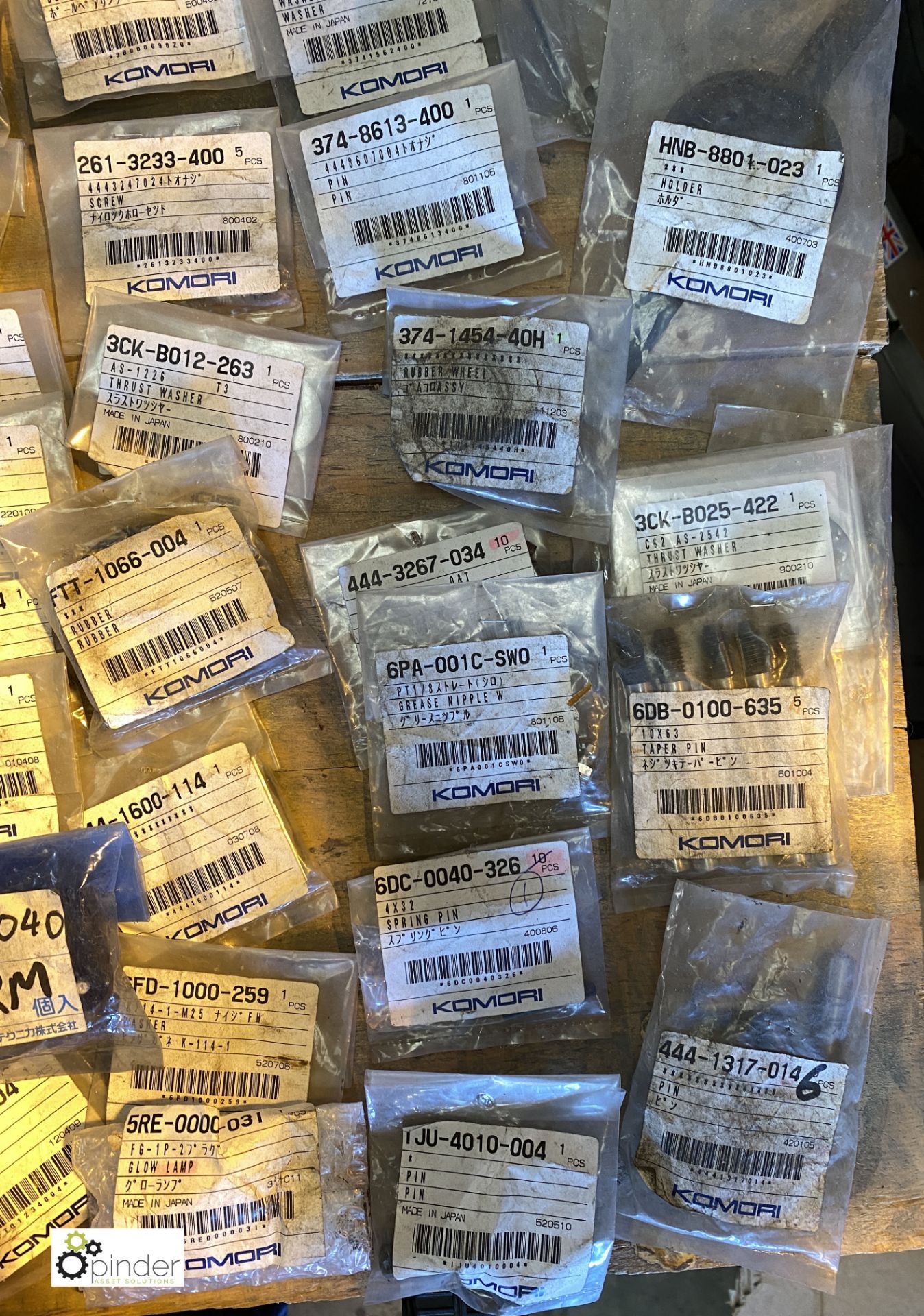 Large quantity of unused Komori spare parts inc. valves, bolts, wheels, springs, nipples, - Image 21 of 26