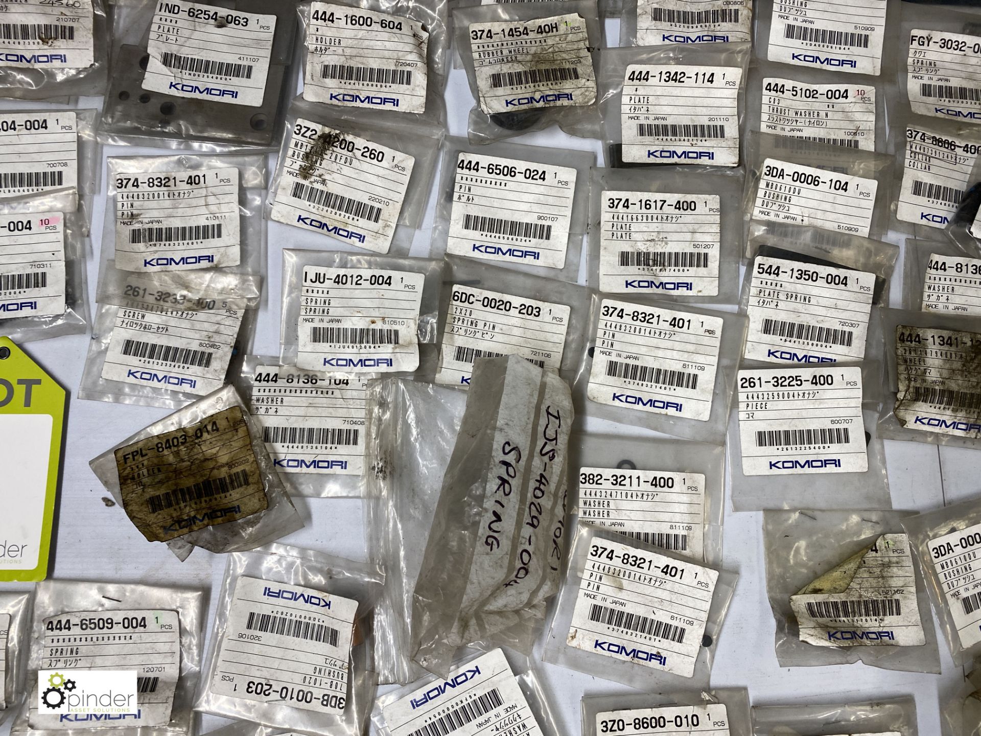 Large quantity of unused Komori spare parts inc. pins, knobs, washers, feeder tape, brackets, - Image 11 of 18