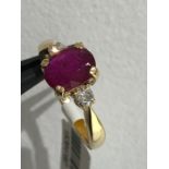 18k yellow gold ring with 1.89ct untreated ruby with 2 diamond side stones