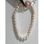 freshwater pearl bracelet with silver clasp and gold plating