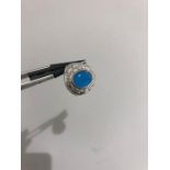 silver gents college ring with blue stone