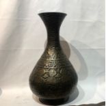 A large Eastern Repousse brass vase 50cm tall