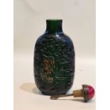 19th/20th century Chinese Carved Glass Snuff Bottle With Floral Scenes Signed