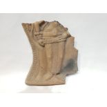 A Terracotta Fragment Depicting the Lower Half of a Female Figure