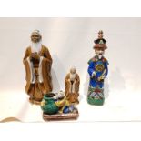 4 Brown Chinese Porcelain Figures Each With a Different Gestures