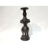 Oriental Bronze Candle Stick With Unusual Engravings and Decorations of Foliage and Creatures