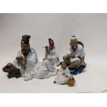 4 Chinese Porcelain Figures Each With a Different Gestures