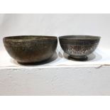 2 ISLAMIC METAL BOWLS EACH WITH UNIQUE ENGRAVINGS AND TRANSCRIPTION