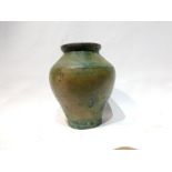 A Small Islamic Green Glass Vase