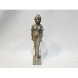 A Turquoise Colored Ceramic Egyptian Pharaoh Figure