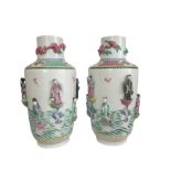 Pair Of Embossed Chinese Famille Rose Vases