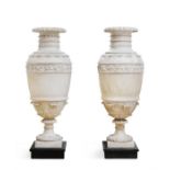 A PAIR OF CARVED ALABASTER URNS, 19TH CENTURY, IN THE NEOCLASSICAL STYLE