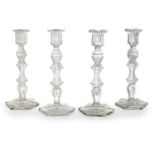 MATCHED SET OF FOUR CUT-GLASS CANDLESTICKS, ATTRIBUTED TO BACCARAT LATE 19TH/ EARLY 20TH CENTURY