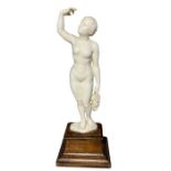 Late 19th Century Ivory Figure Of A Girl Holding Grapes