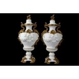 A PAIR OF VERY LARGE 19TH CENTURY SÈVRES STYLE BISCUIT PORCELAIN VASE AND COVERS