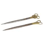 A pair of Middle Eastern Islamic steel and brass calligraphy scissors