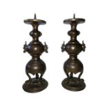 PAIR OF CHINESE BRONZE ARCHARIC SHAPED CANDLESTICKS 19TH CENTURY QING PERIOD