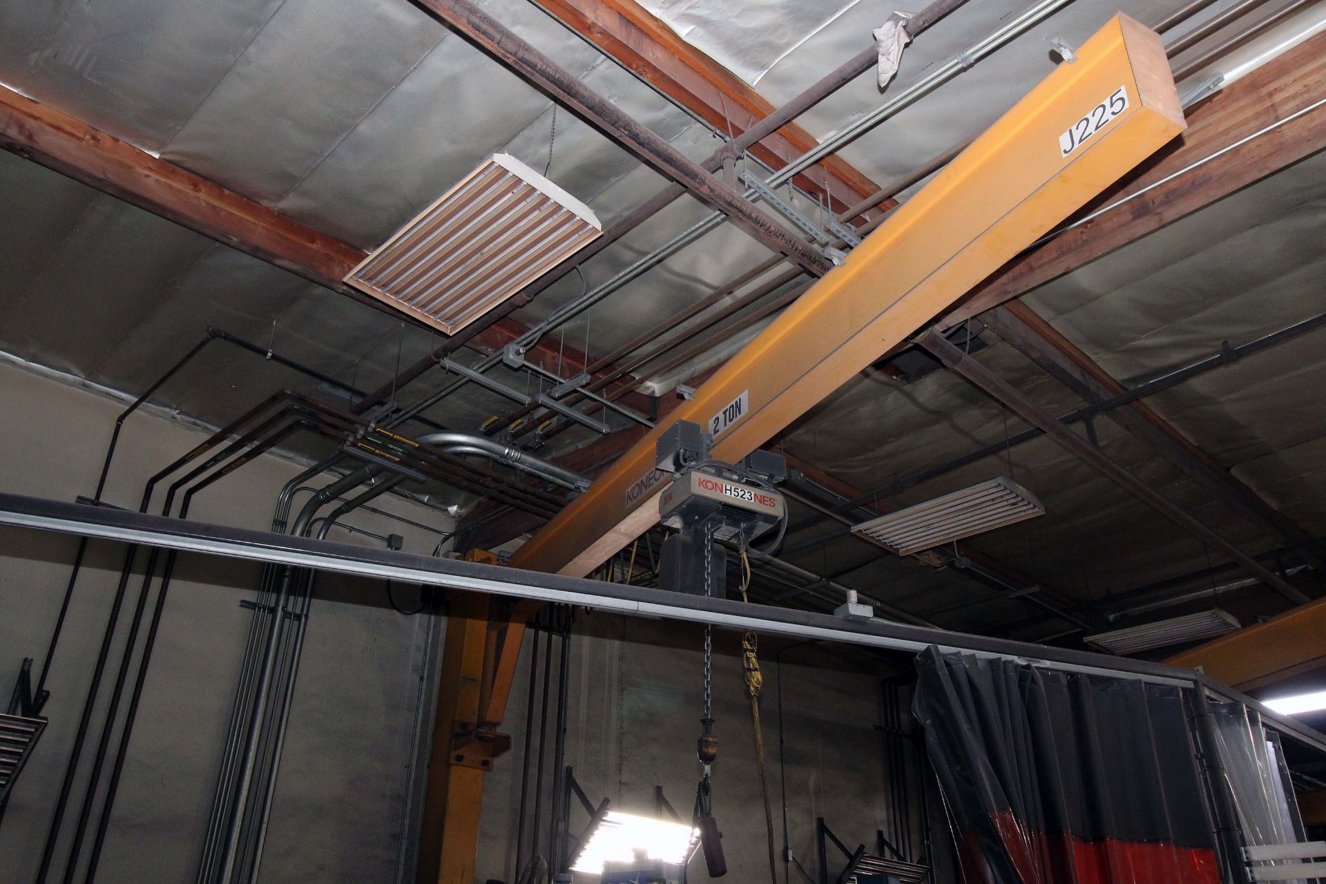 COLUMN MOUNTED JIB CRANE, 2 T. X APPROX. 21' REACH, 14' ht. under hook, Kone 2 T. elec. chain hoist,