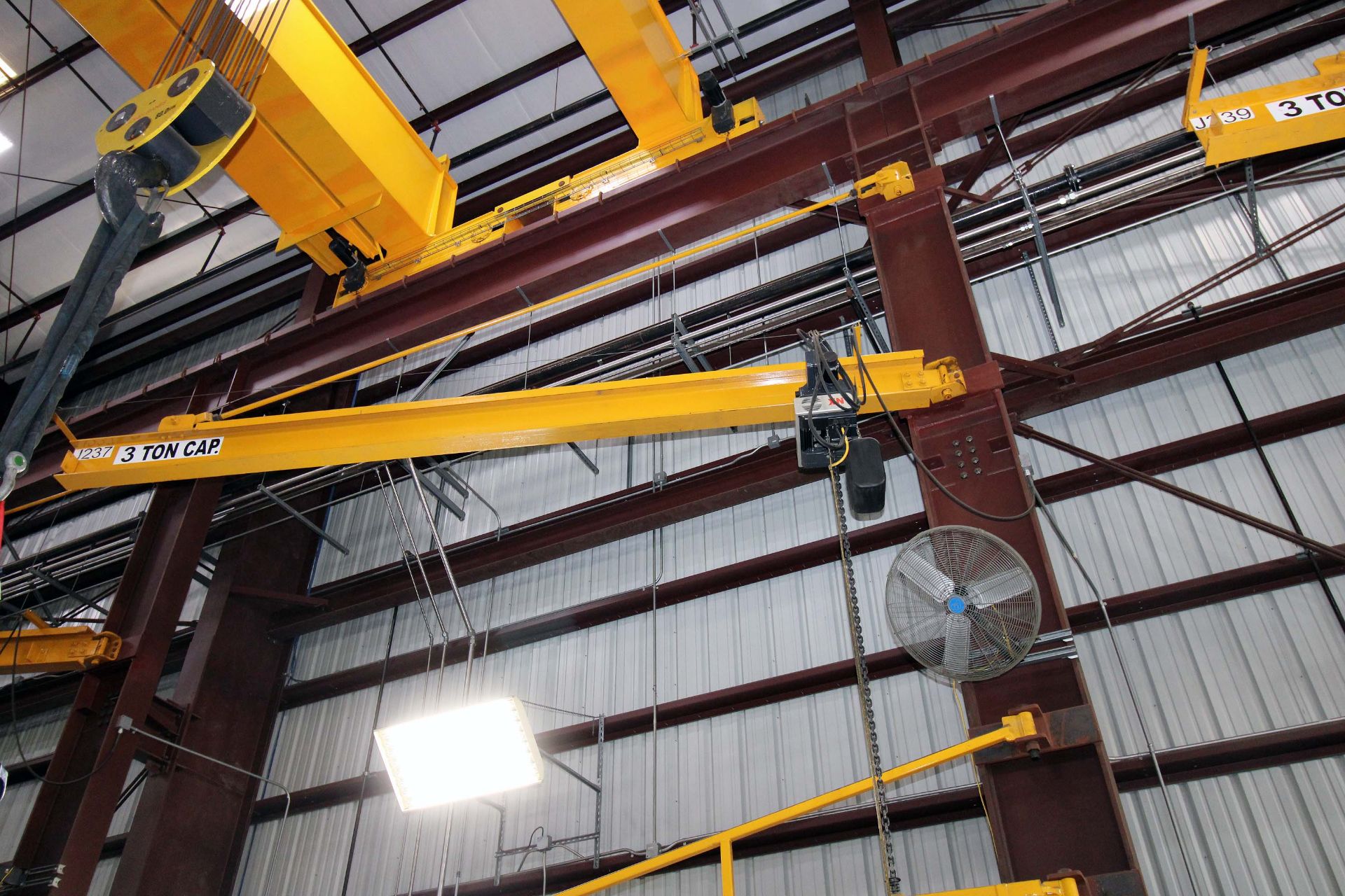 COLUMN MOUNTED JIB CRANE, 3 T. X APPROX. 20' REACH, 18' ht. under hook, Kone 3 T. elec. chain hoist,