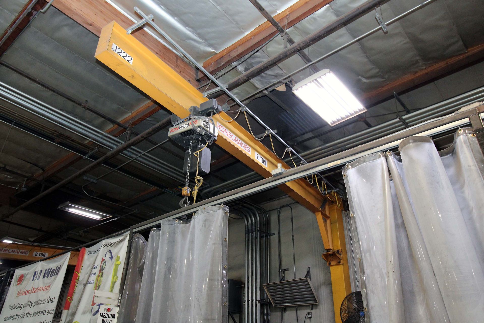 COLUMN MOUNTED JIB CRANE, 2 T. X APPROX. 21' REACH, 14' ht. under hook, Kone 2 T. elec. chain hoist,