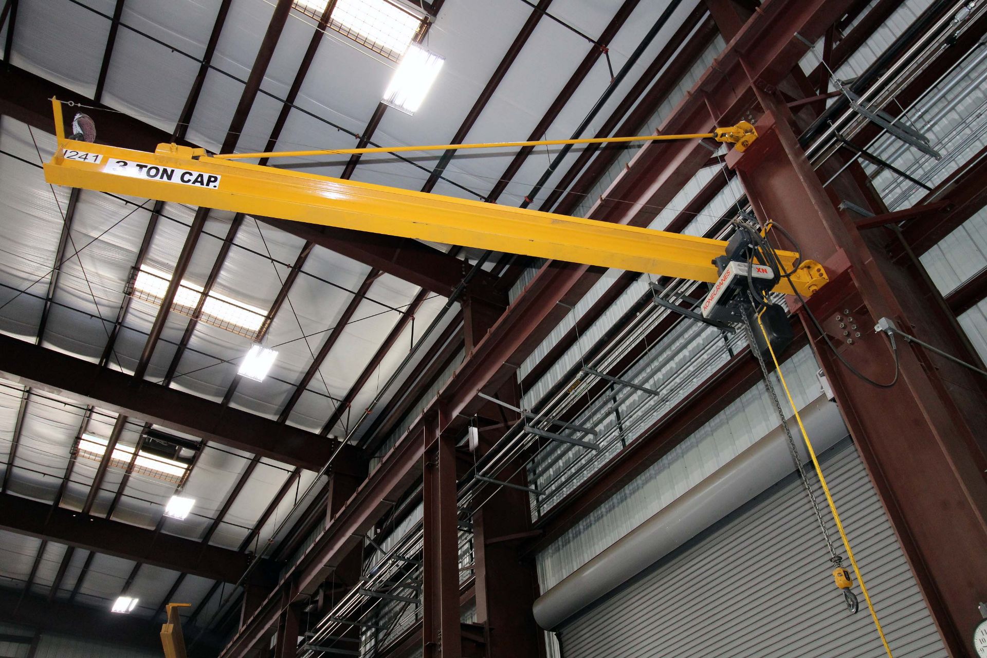 COLUMN MOUNTED JIB CRANE, 3 T. X APPROX. 20' REACH, 18' ht. under hook, Kone 3 T. elec. chain hoist,