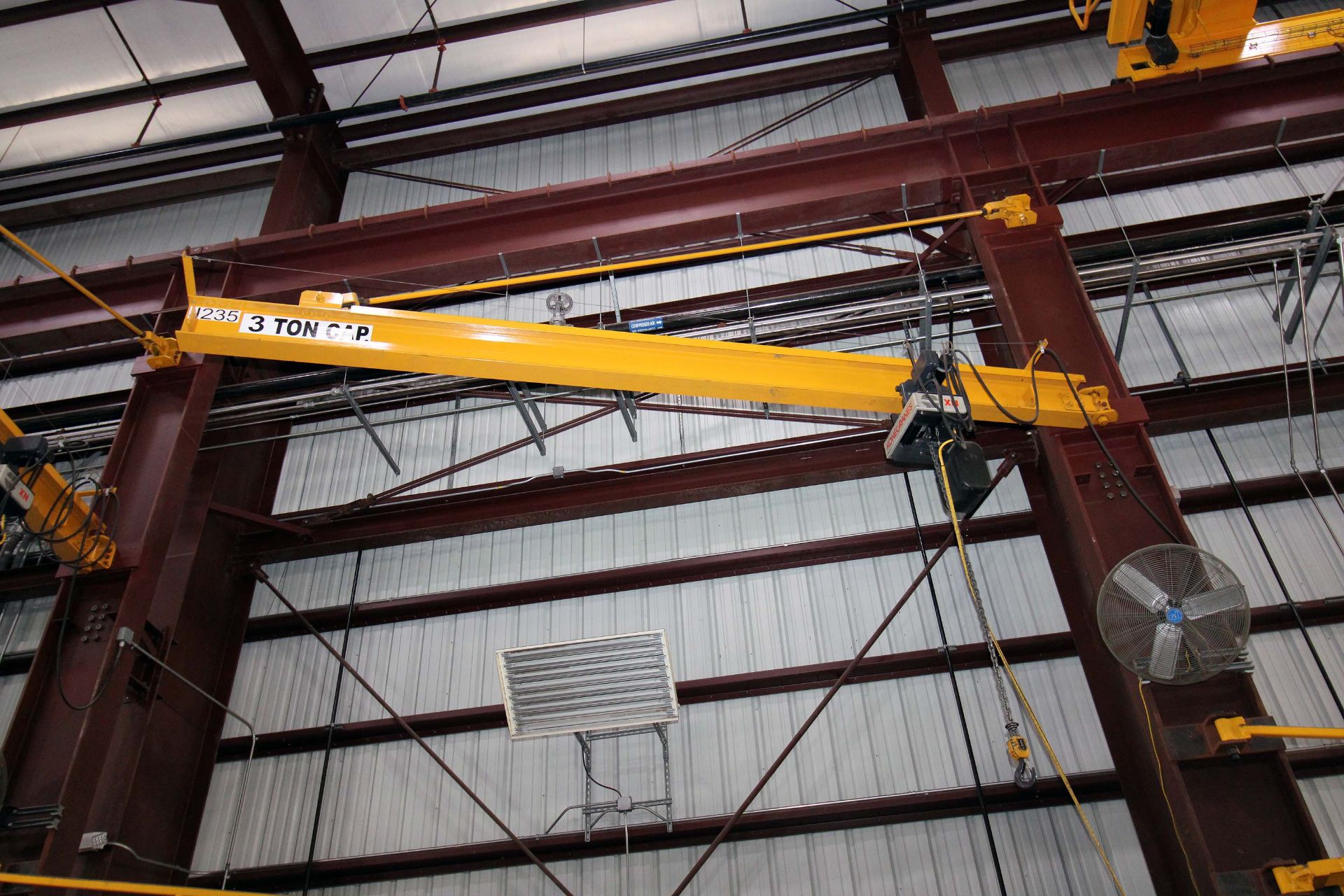 COLUMN MOUNTED JIB CRANE, 3 T. X APPROX. 20' REACH, 18' ht. under hook, Kone 3 T. elec. chain hoist,