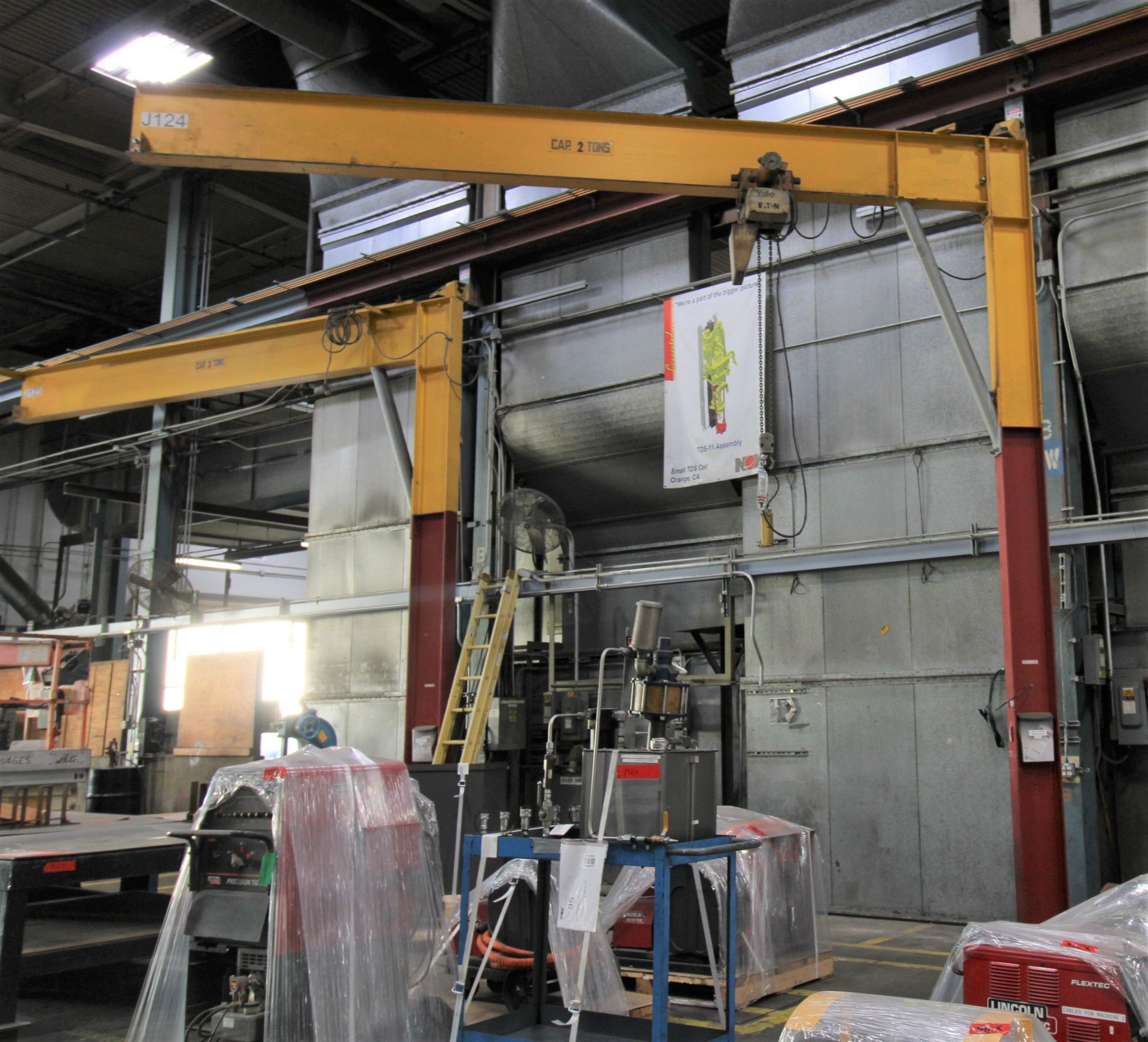 COLUMN/ FLOOR MOUNTED JIB CRANE, 2 T. X APPROX. 20' REACH, 16' ht. under hook, 2 T. elec. chain