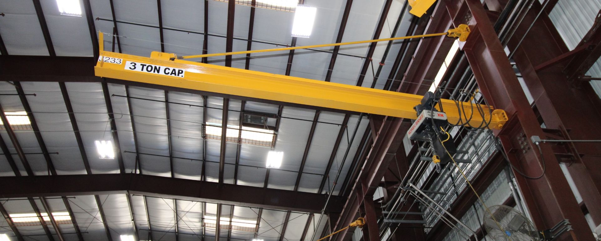 COLUMN MOUNTED JIB CRANE, 3 T. X APPROX. 20' REACH, 18' ht. under hook, Kone 3 T. elec. chain hoist,